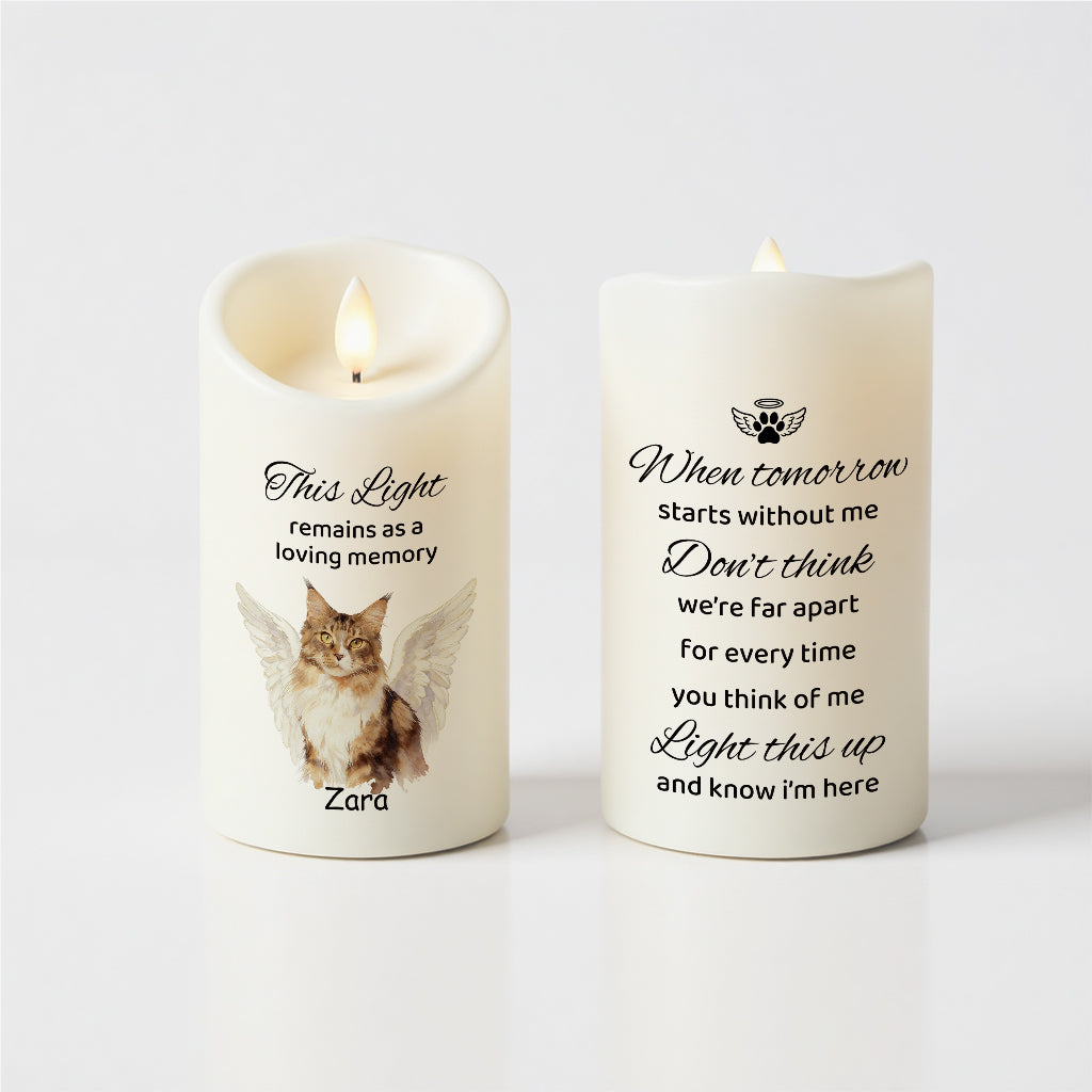 Back of pet memorial angel wings candle showing custom name, dates, and memorial message