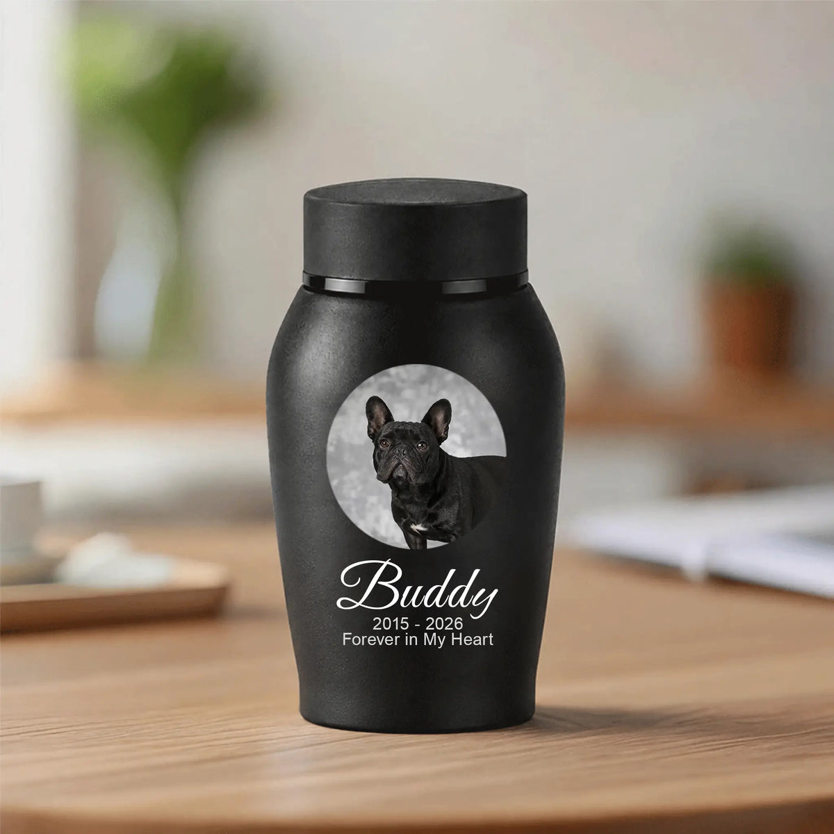 Custom dog ashes urn with pet photo and name displayed on a wooden table in a peaceful home setting