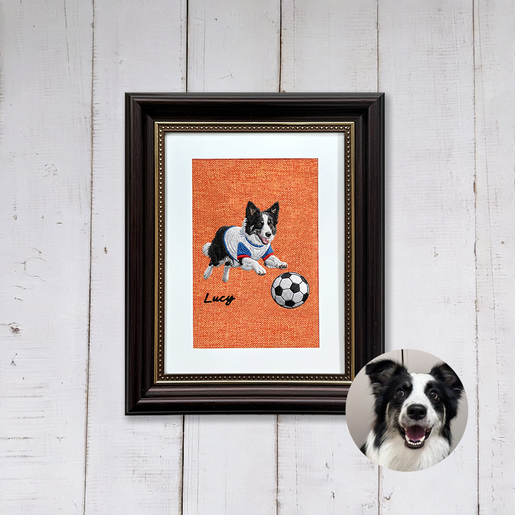 Close-up of soccer-themed pet embroidery showing stitched jersey kit and ball detail on linen