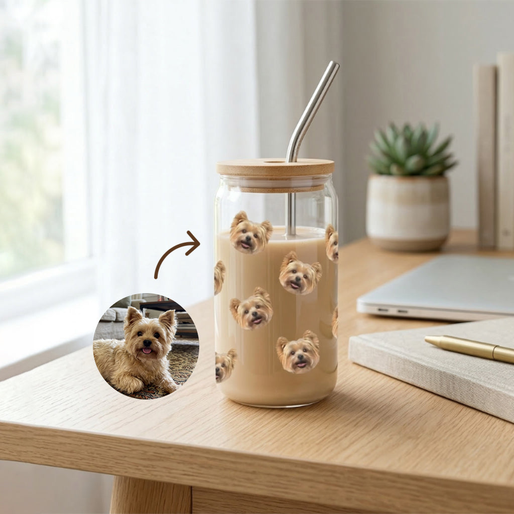 Personalized pet portrait glass can cup held outdoors showing custom illustrated pet design