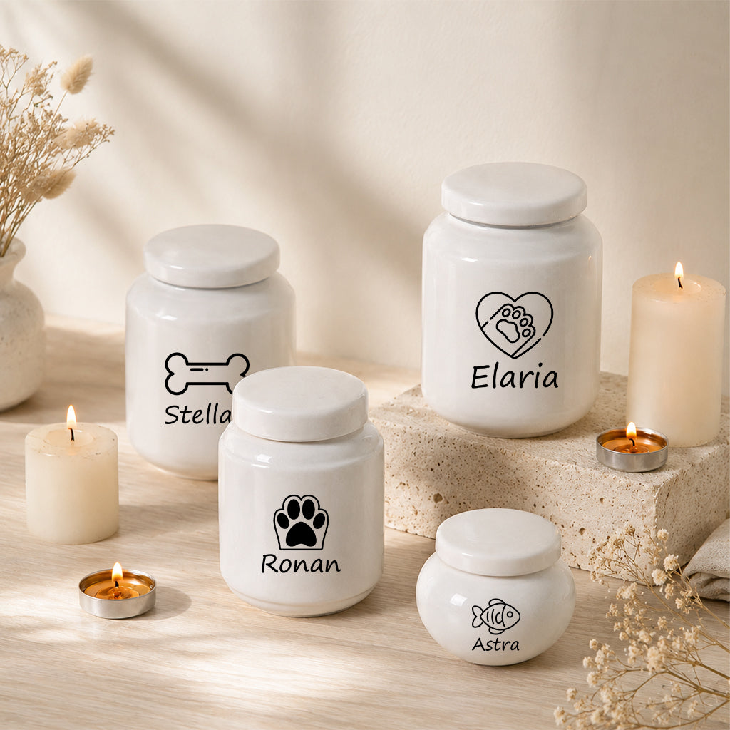 Personalized ceramic pet urn Design A in small size shown with engraved name and simple motif
