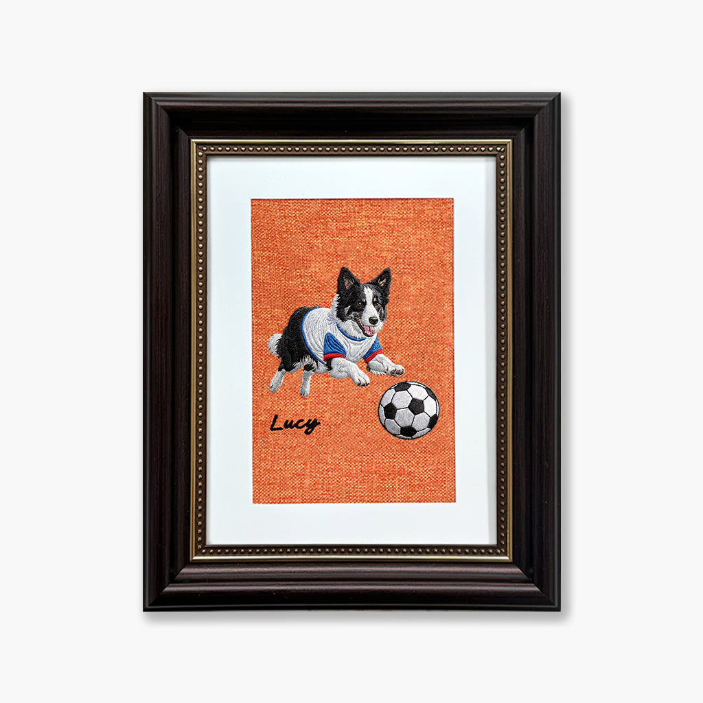 Custom pet portrait embroidery with pet in a soccer World Cup jersey stitched on natural linen in a frame