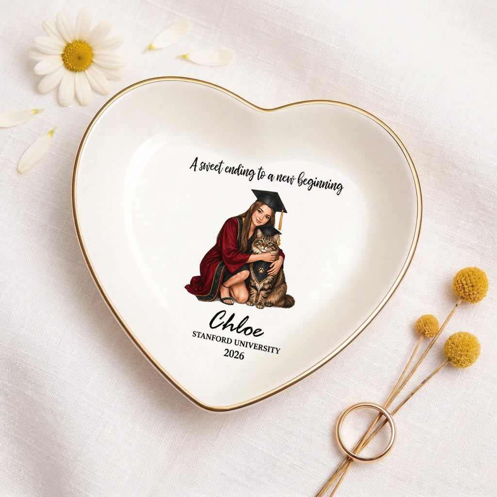 Custom grad and pet jewelry dish shown in heart shape as a personalized graduation keepsake gift
