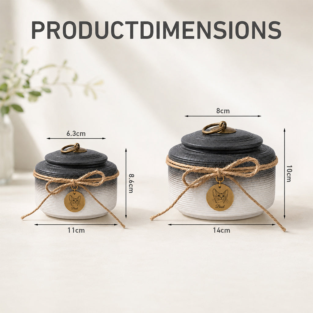 Cat cremation urn with charm tag displayed as a cat loss memorial gift on a wooden surface
