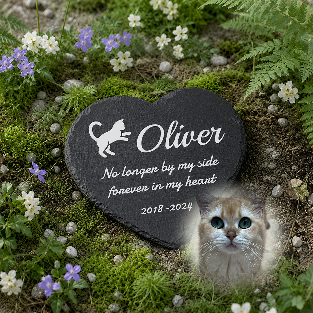 Close-up of laser-engraved cat name and memorial text on a heart-shaped slate garden stone
