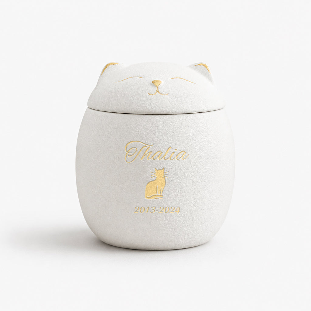 Size guide for cat-shaped ceramic cremation urn showing dimensions and capacity