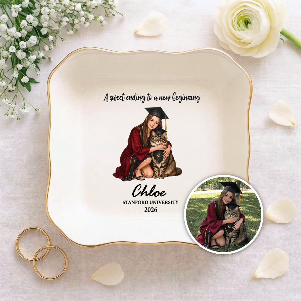 Close-up of illustrated graduate and pet side by side on a custom ceramic graduation ring dish