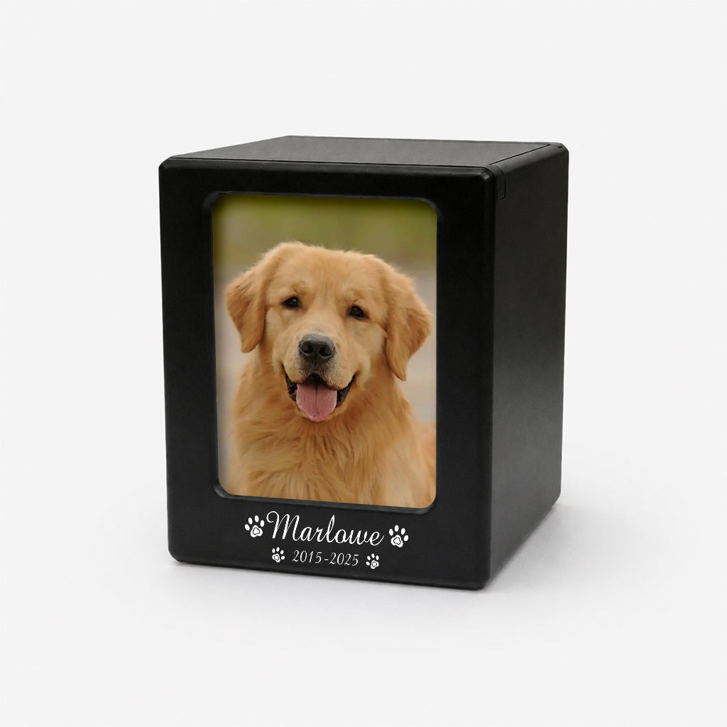 Black wooden dog cremation urn box displayed on a surface as a personalized dog memorial keepsake