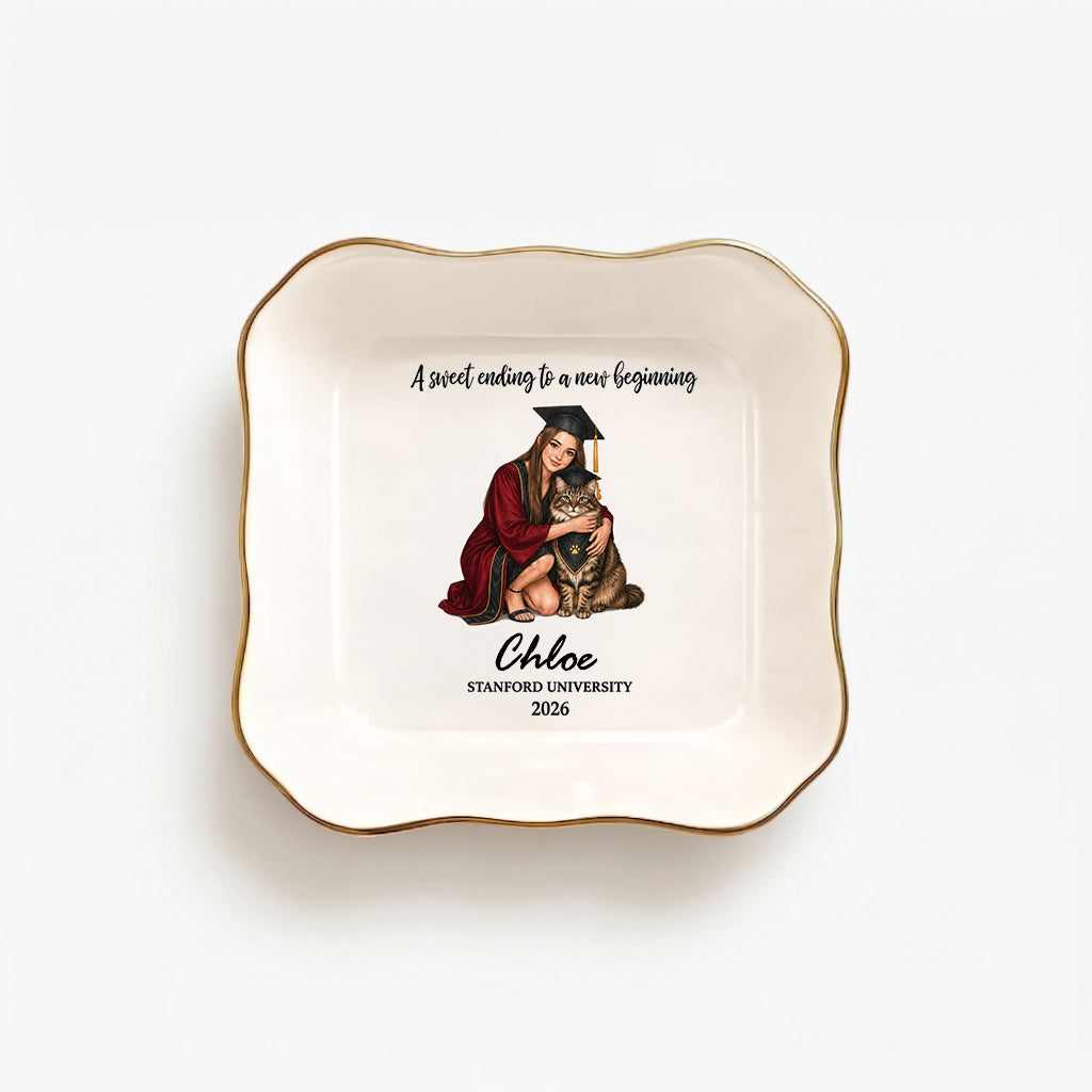 Personalized graduation jewelry dish with illustrated grad and pet portrait together on a ceramic trinket tray