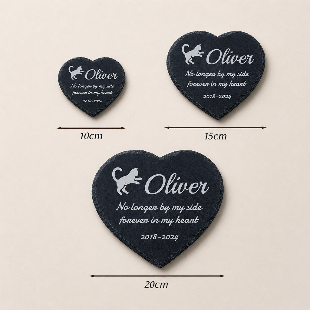 Heart-shaped cat memorial garden stone standing upright showing full engraving and slate texture