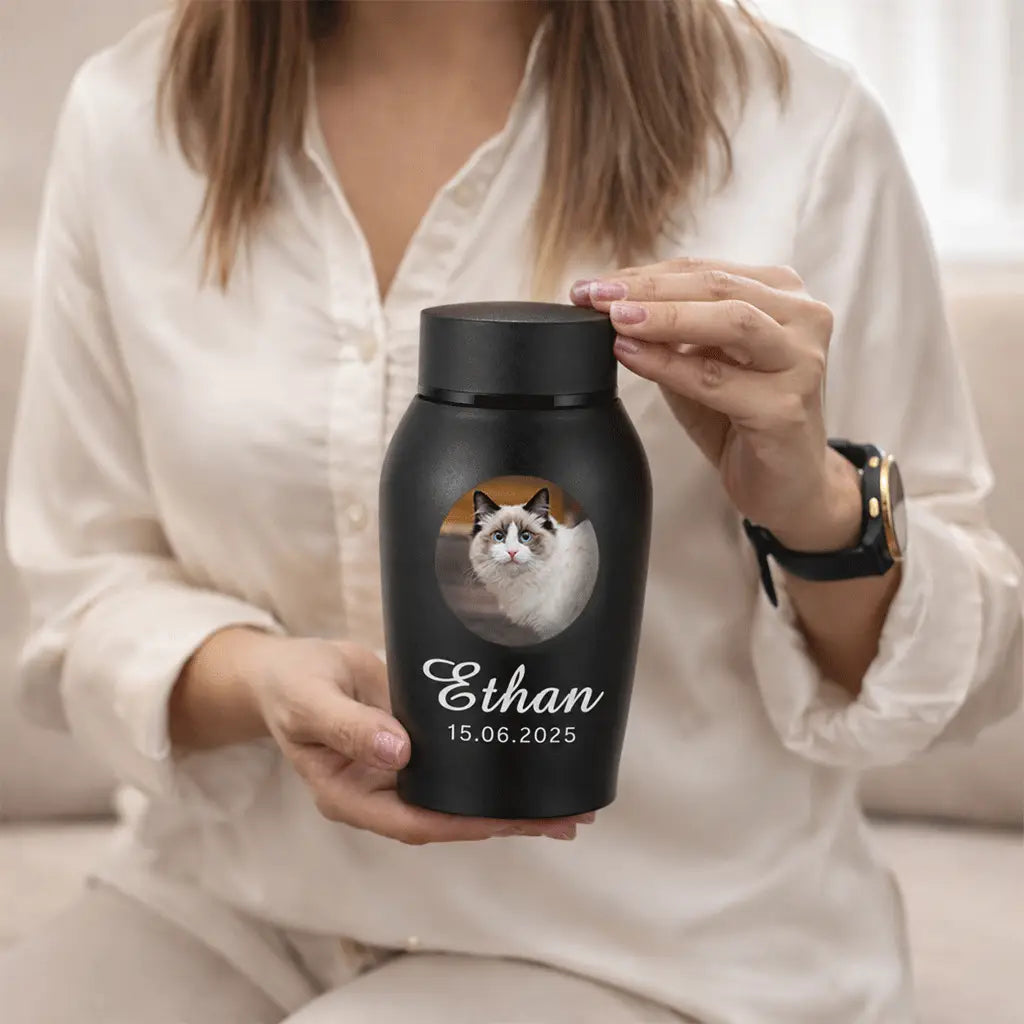 Personalized cat memorial urn for ashes shown in small and large sizes side by side