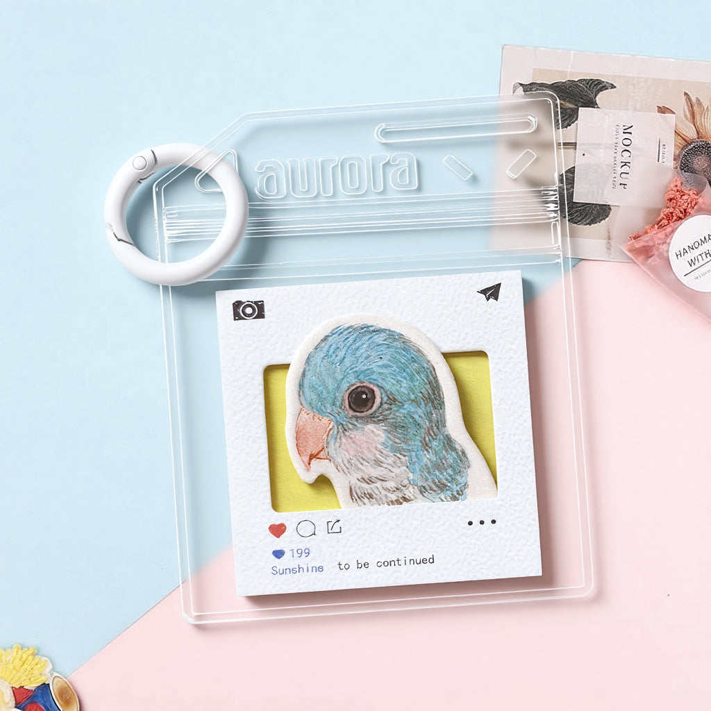 Custom parrot watercolor keychain attached to a set of keys showing everyday carry size