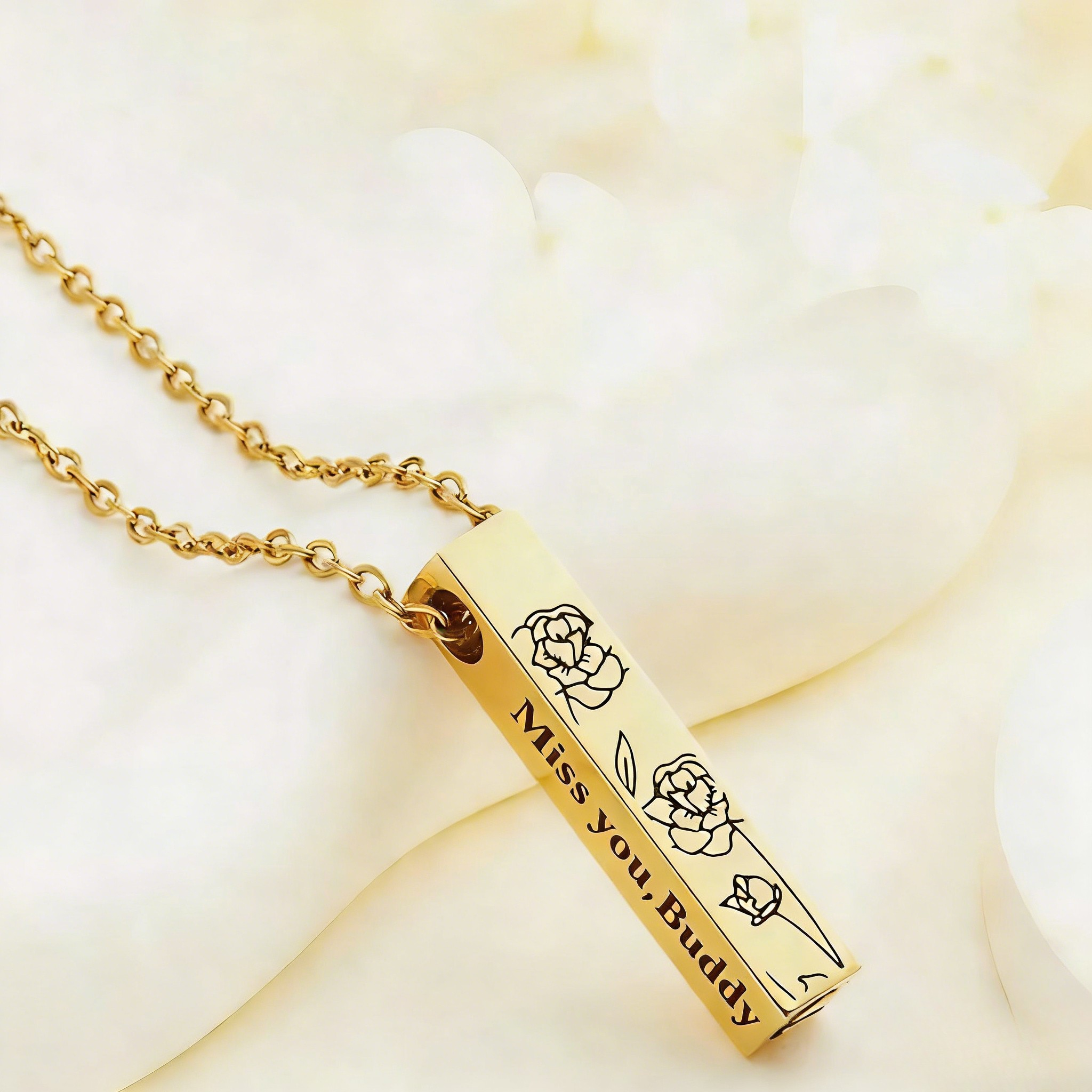 Pet memorial bar necklace in gold, silver, and rose gold finish options laid flat