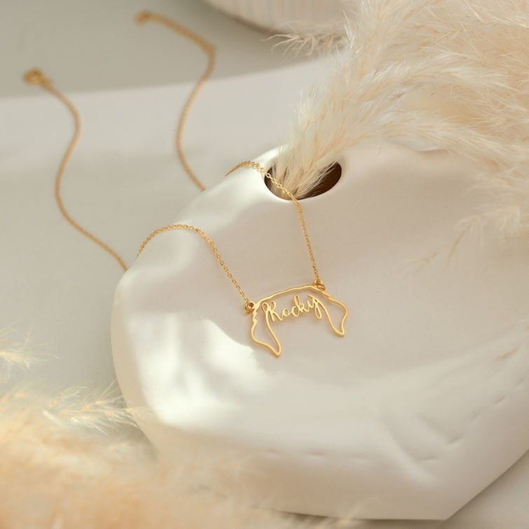 Custom pet name necklace shown in gold, silver, and rose gold finish options side by side