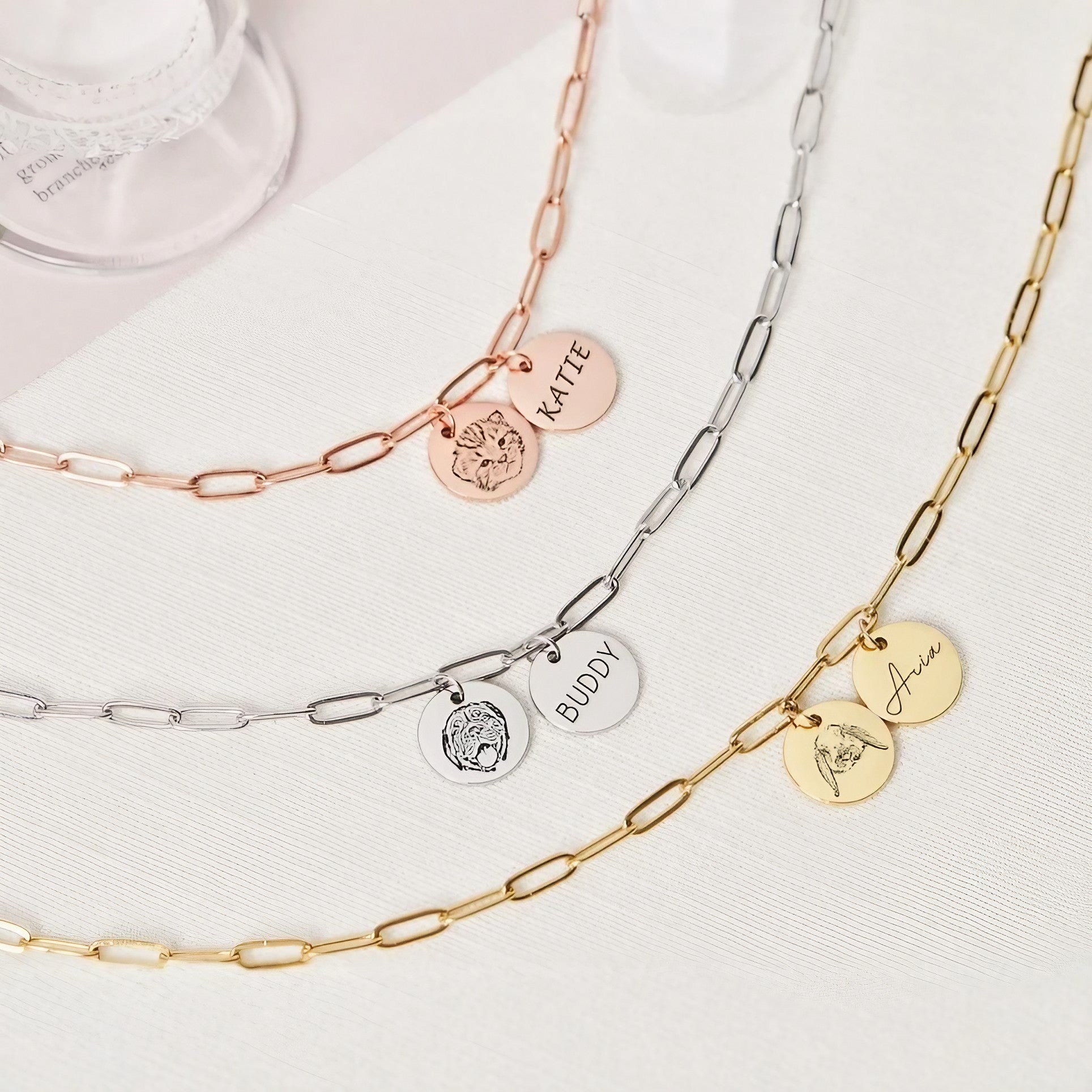 Custom pet name and photo charm necklace shown in gold, silver, and rose gold finishes