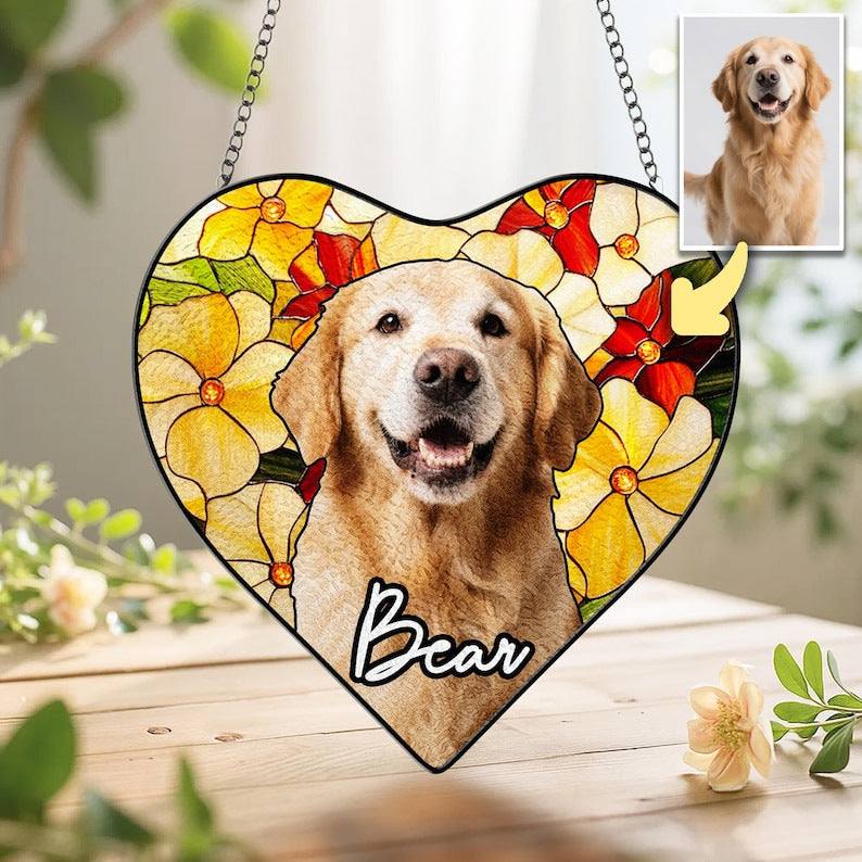 Heart-shaped water ripple glass suncatcher with a dog portrait and the engraved name Bear on a wooden surface