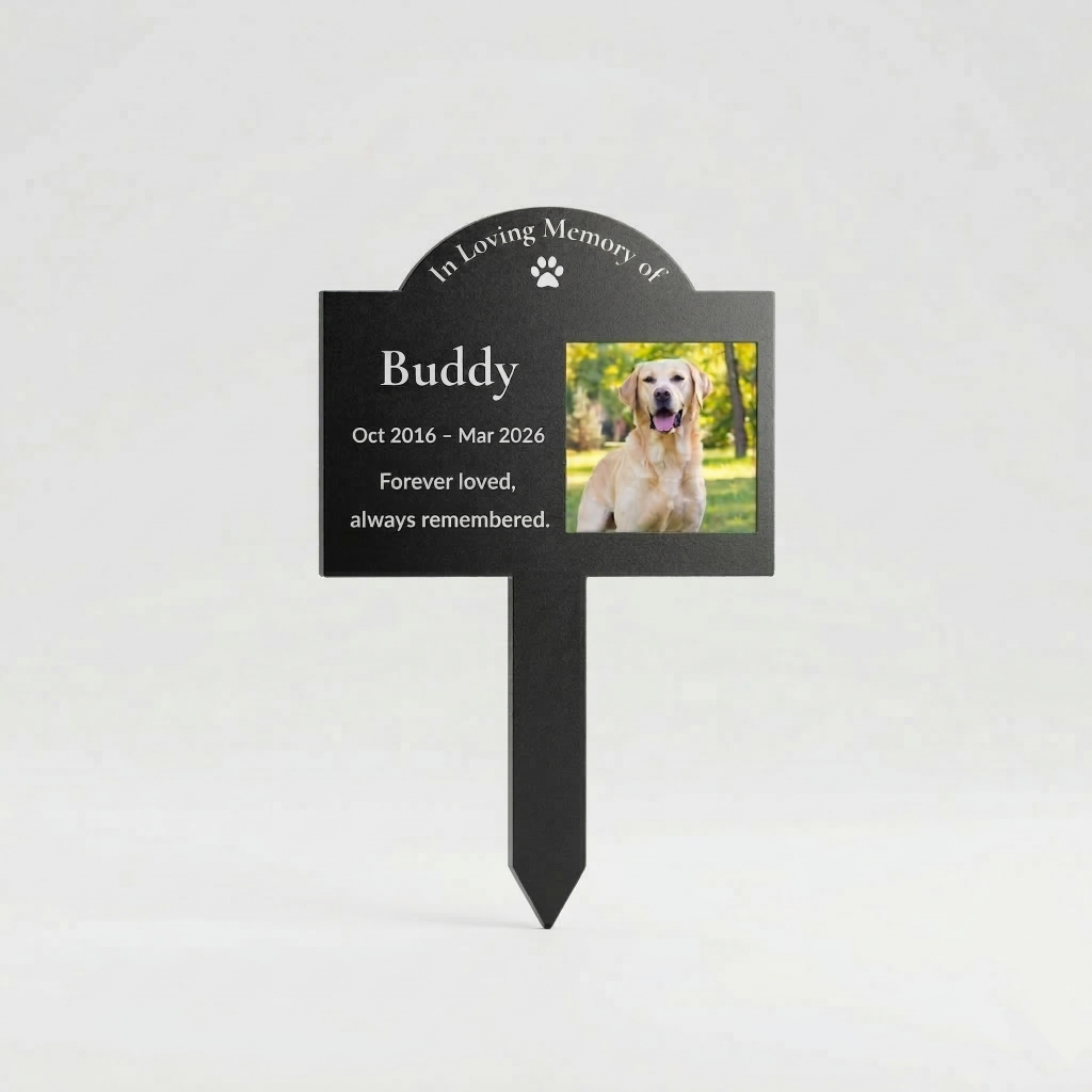 Close-up of personalized pet memorial garden stake showing engraved pet photo, name, and memorial dates