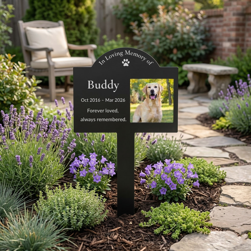 Custom pet memorial garden stake placed beside a stone garden path as an outdoor remembrance marker