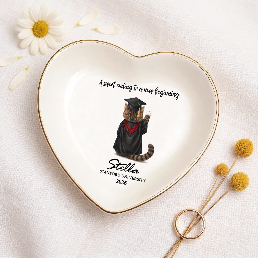 Pet graduation jewelry dish shown in heart shape with custom cat portrait in a graduation cap