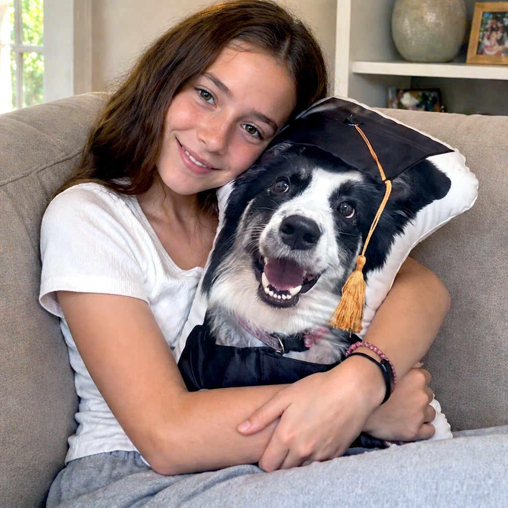 Close-up of pet face and graduation cap illustration on a soft custom graduation pillow