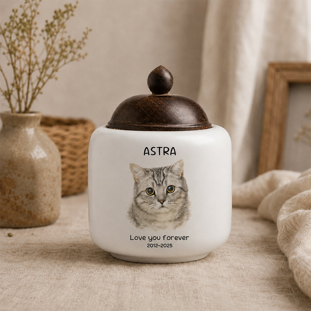 Custom cat cremation urn displayed on a shelf in a home setting as a cat memorial keepsake gift