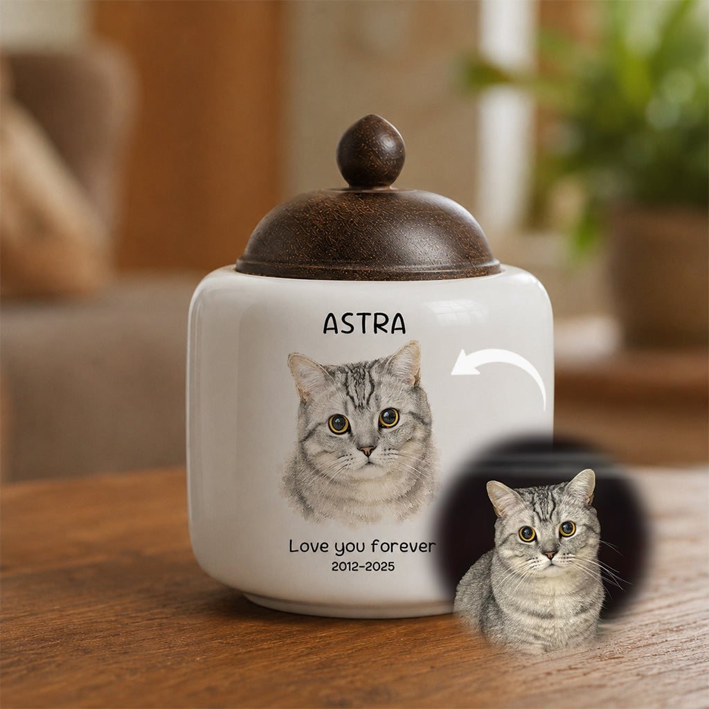 Side view of personalized cat memorial urn showing watercolor portrait placement and natural wood lid on white ceramic