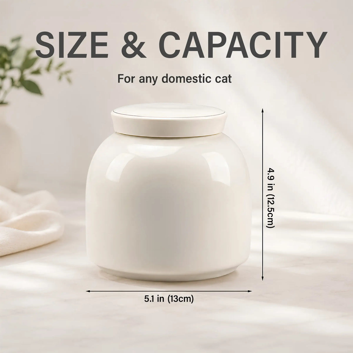 Cream ceramic cat urn size chart: 5.1 in (13 cm) wide and 4.9 in (12.5 cm) tall, sized for any domestic cat