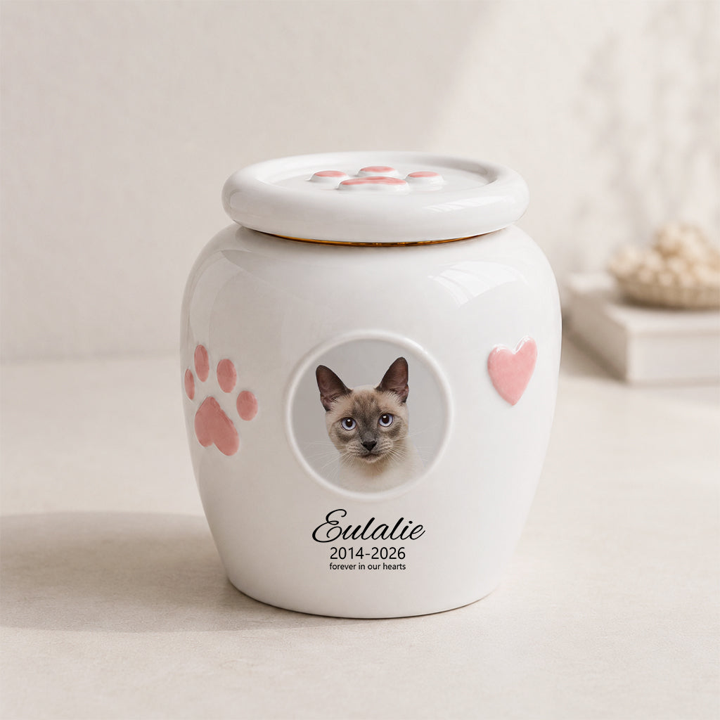 Side view of cat cremation urn with photo window showing smooth white ceramic finish