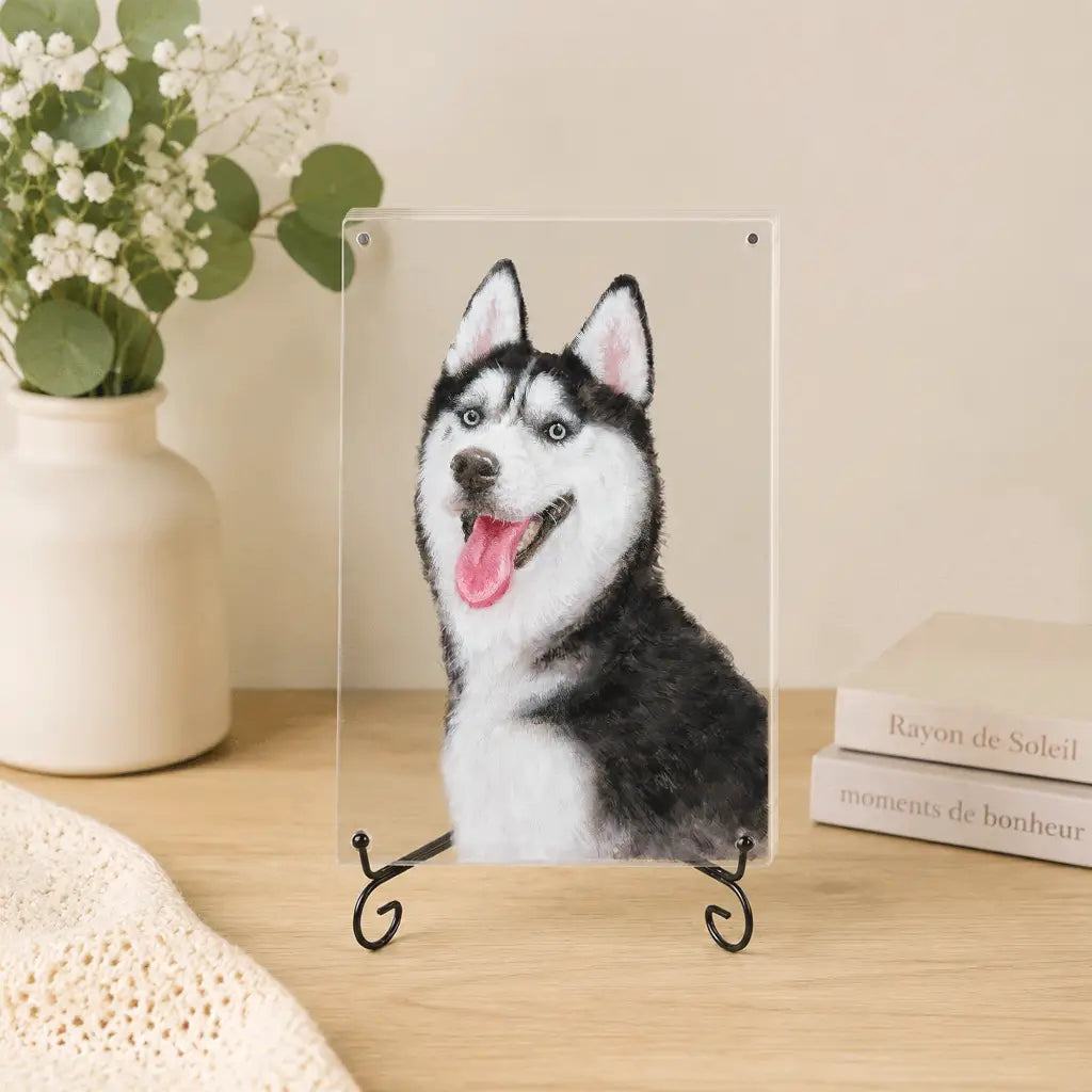 Frameless hand-painted husky portrait on clear acrylic panel displayed on a black easel stand
