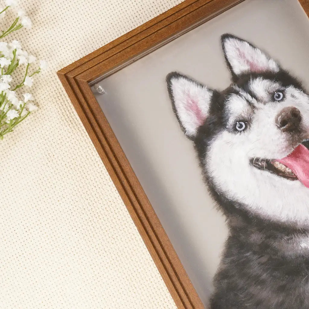 Close-up of hand-painted husky fur and eye detail inside the walnut wood frame corner