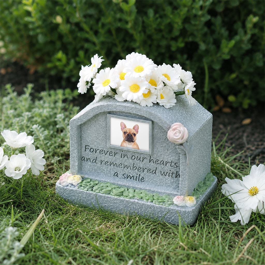 Front view of dog memorial resin figurine showing personalized photo frame and engraved name