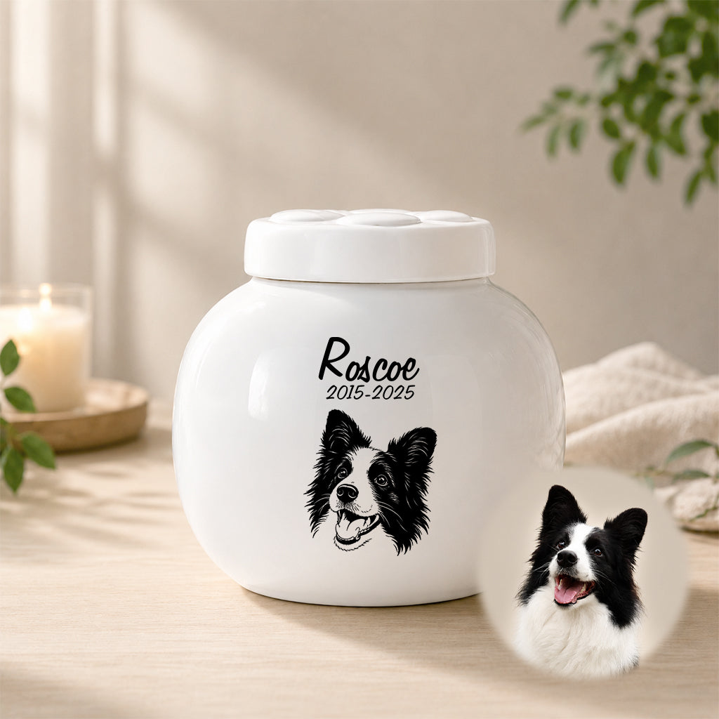 Dog memorial urn showing line art portrait style with name and remembrance years on the front