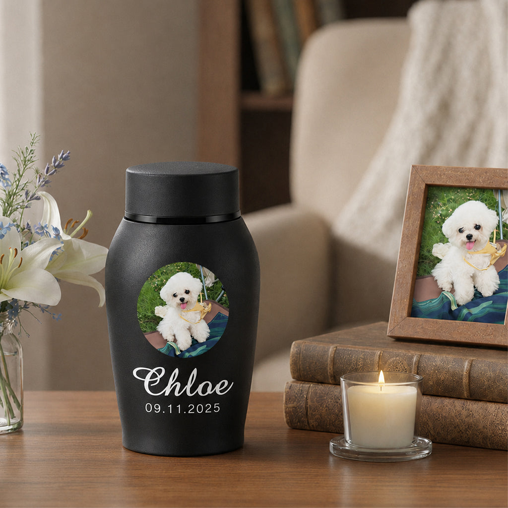 Close-up of engraved dog photo and name on a custom dog memorial urn for ashes