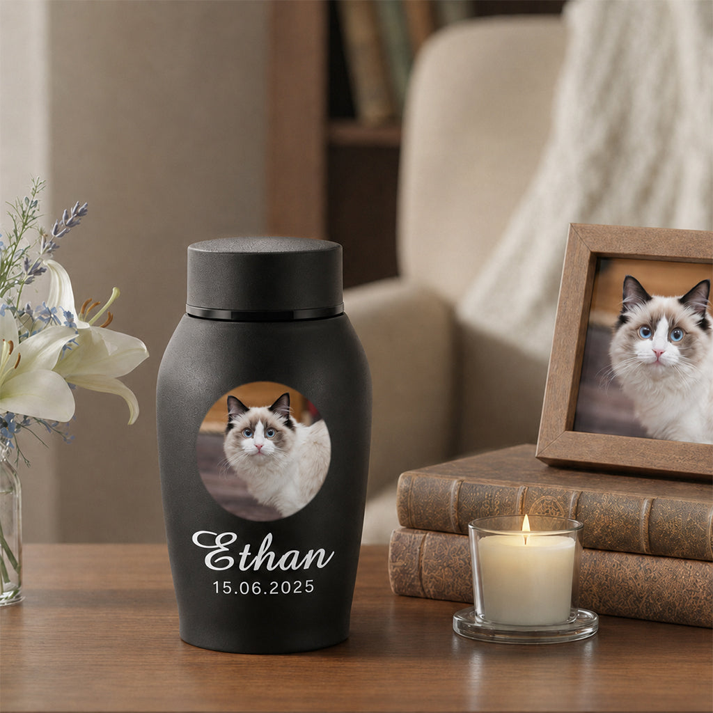 Close-up of engraved cat photo and name on a custom cat memorial urn for ashes