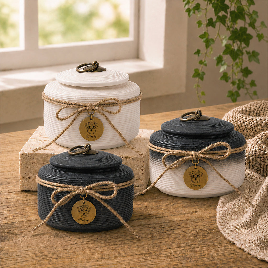 Three finish options for dog cremation urn — ombre, ink black, and pure white — shown together
