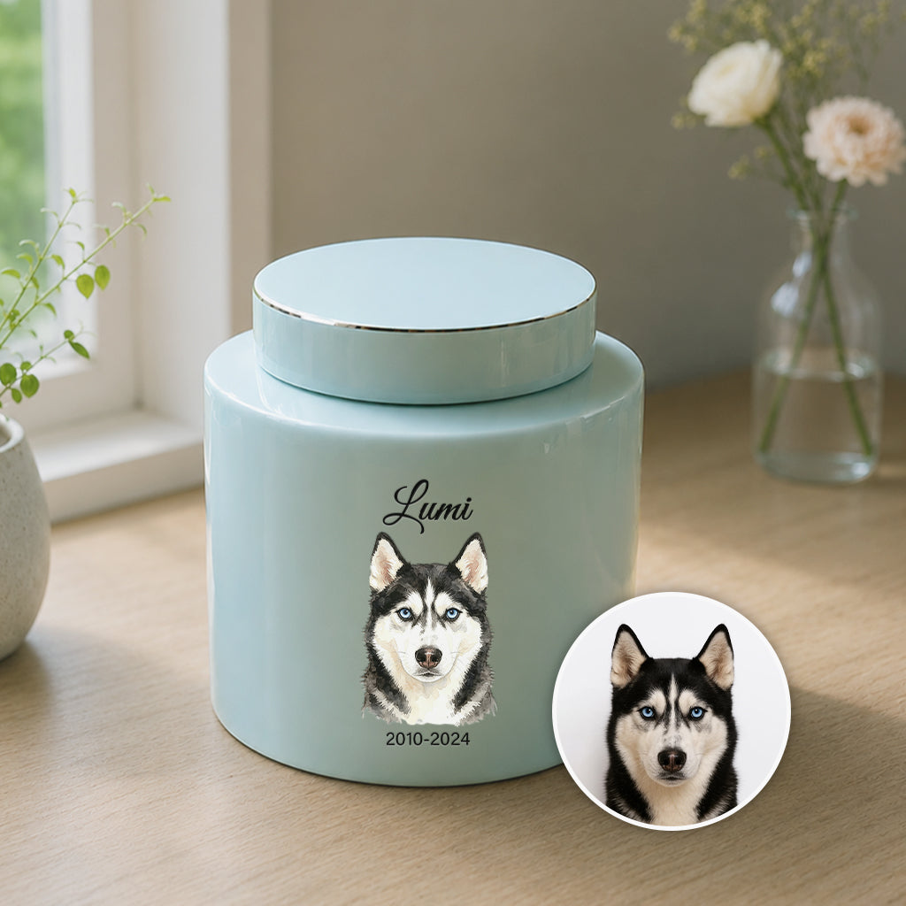 Side view of teal dog memorial urn showing smooth ceramic glaze and portrait placement