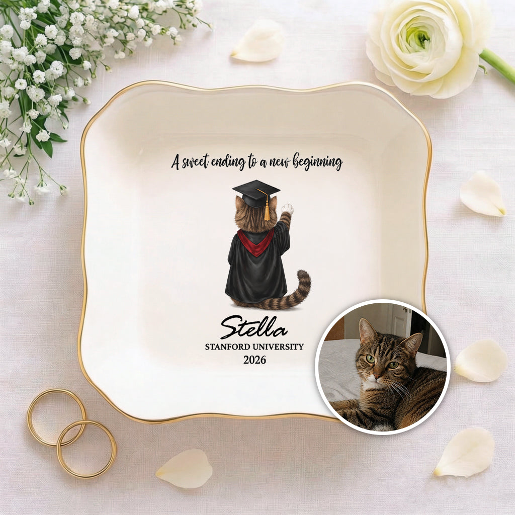 Close-up of graduation cap and diploma detail on a personalized pet graduation ceramic ring dish