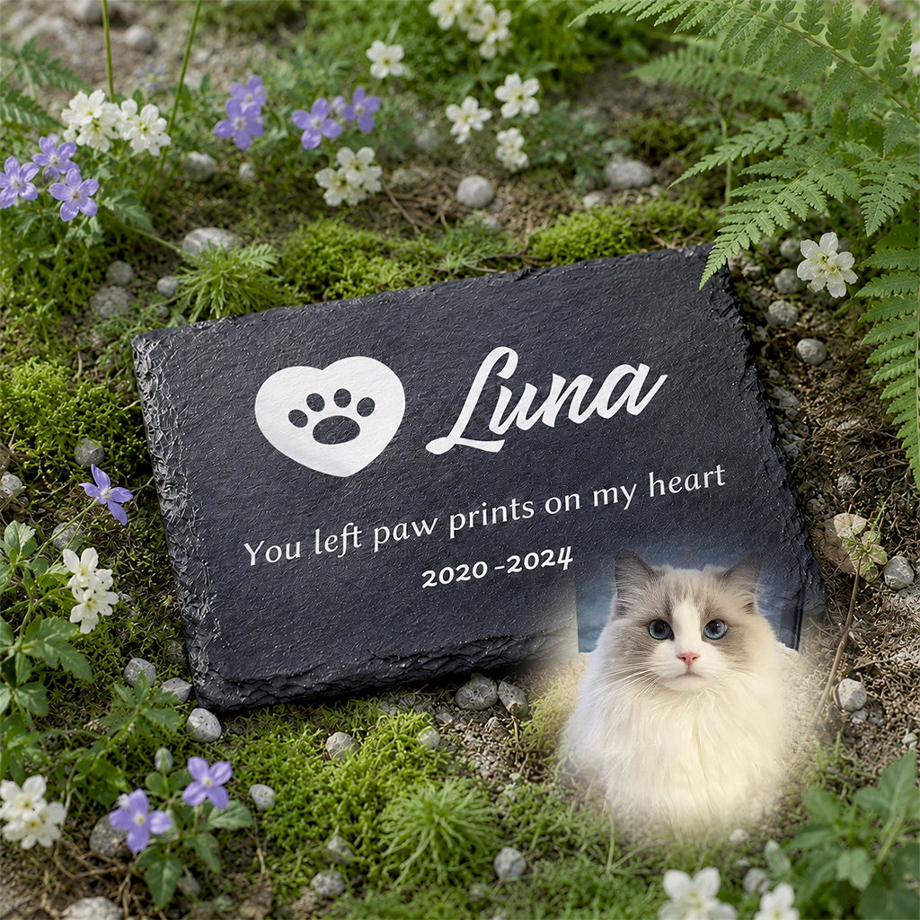 Close-up of laser-engraved name and memorial text on a flat rectangular slate garden plaque