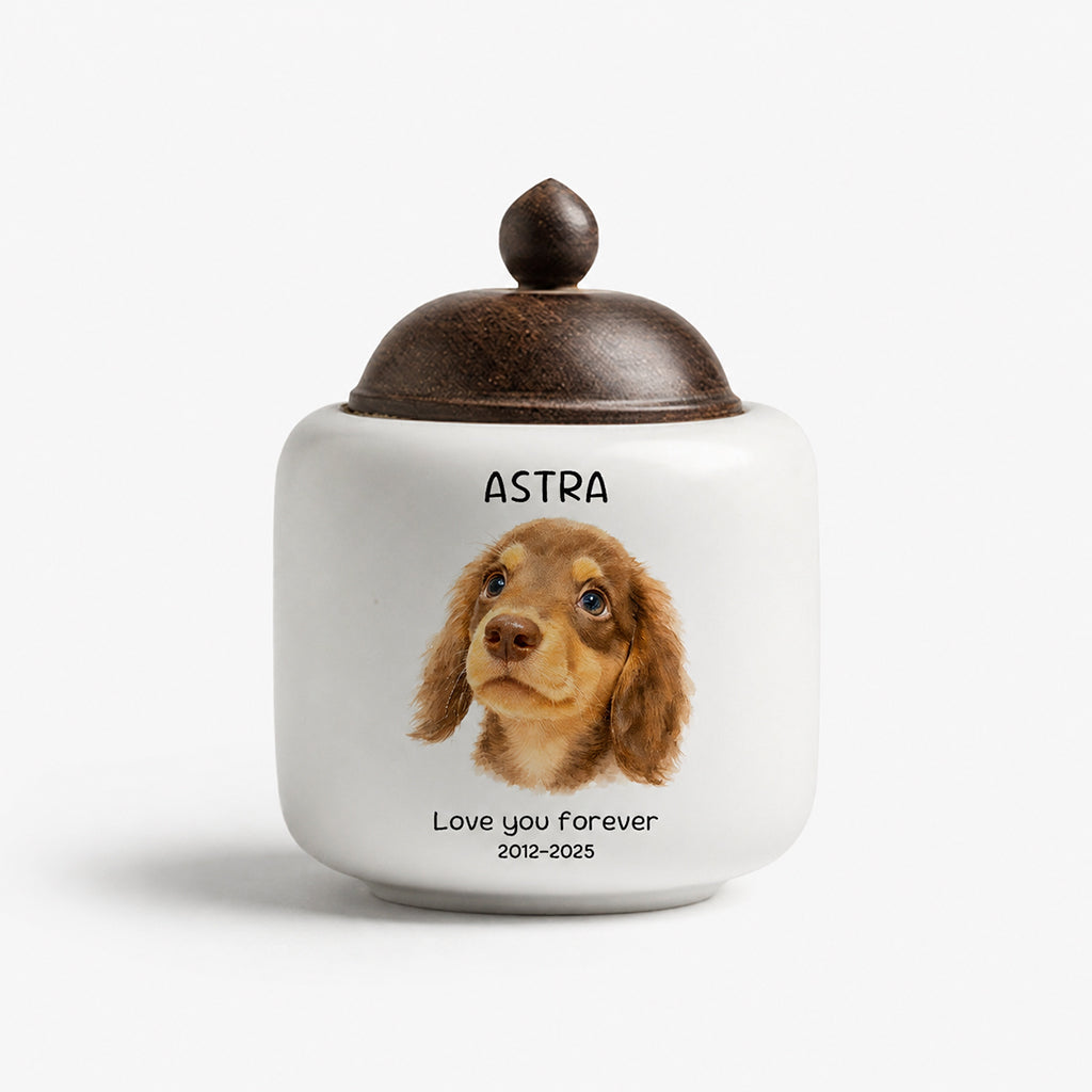 Personalized ceramic dog cremation urn shown from above with the natural wood lid opening