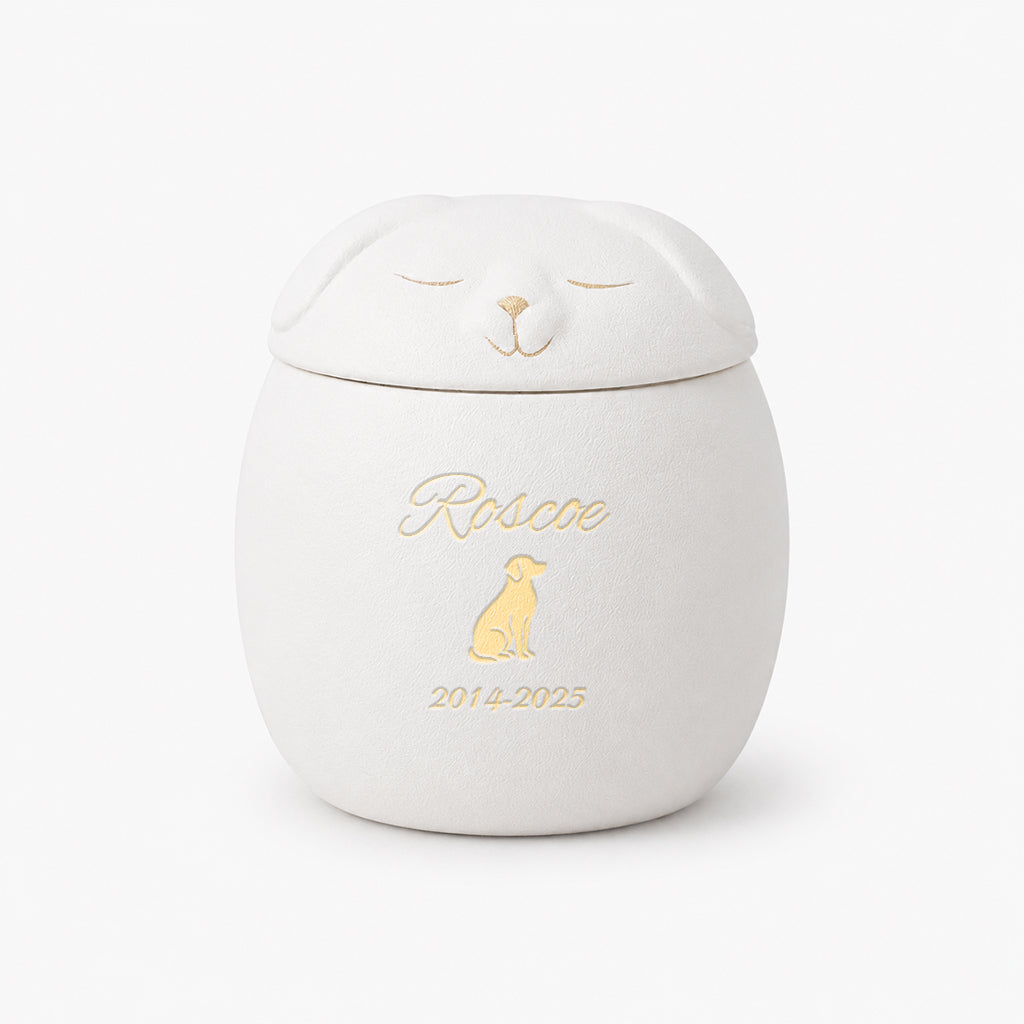 Dog-shaped ceramic cremation urn displayed on a shelf as a personalized dog memorial keepsake