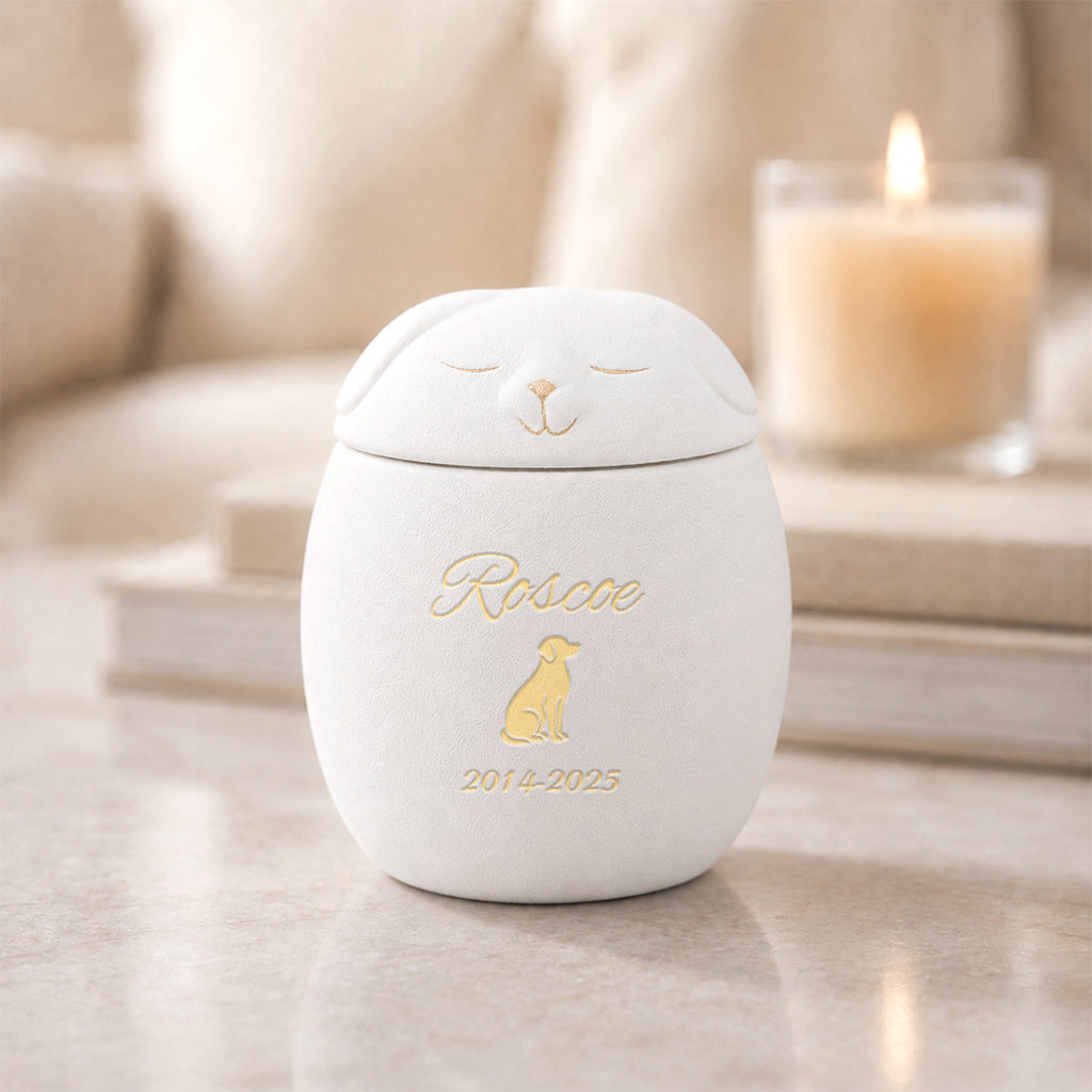 White dog-shaped cremation urn with lid removed showing interior capacity for pet ashes